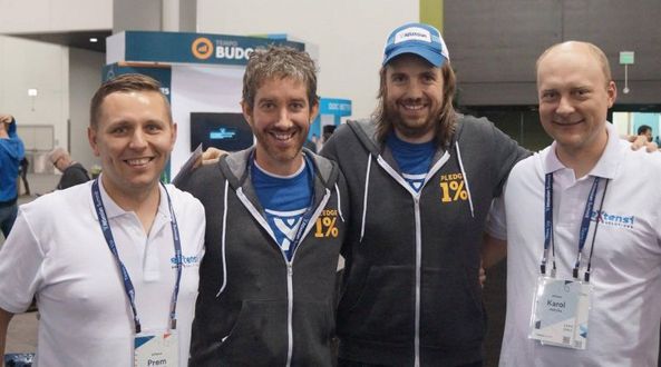 eXtensi co-founders Przemysław Chudziński and Karol Jędryka with Atlassian co-founders Scott Farquhar and Mike Cannon-Brookes.
